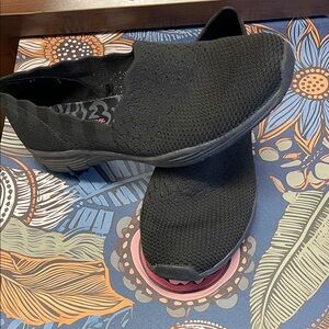 Skechers Women's Black Knit Slip-On Flats